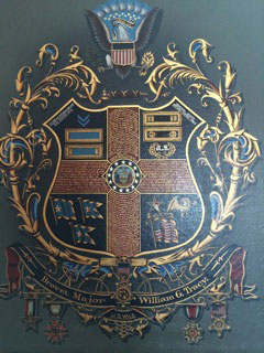 A coat of arms with gold leaf on it.