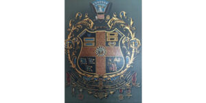 A painting of the coat of arms of the university.