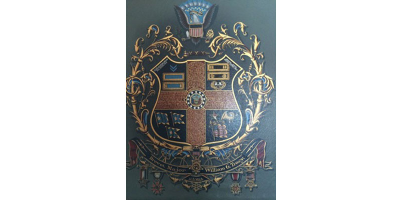 A painting of the coat of arms of the university.