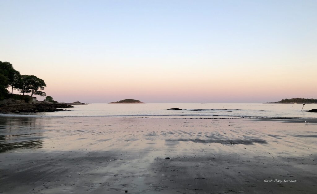 A beach with water and sand on it